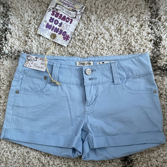 Light blue shorts . - Picture 5 of 5
